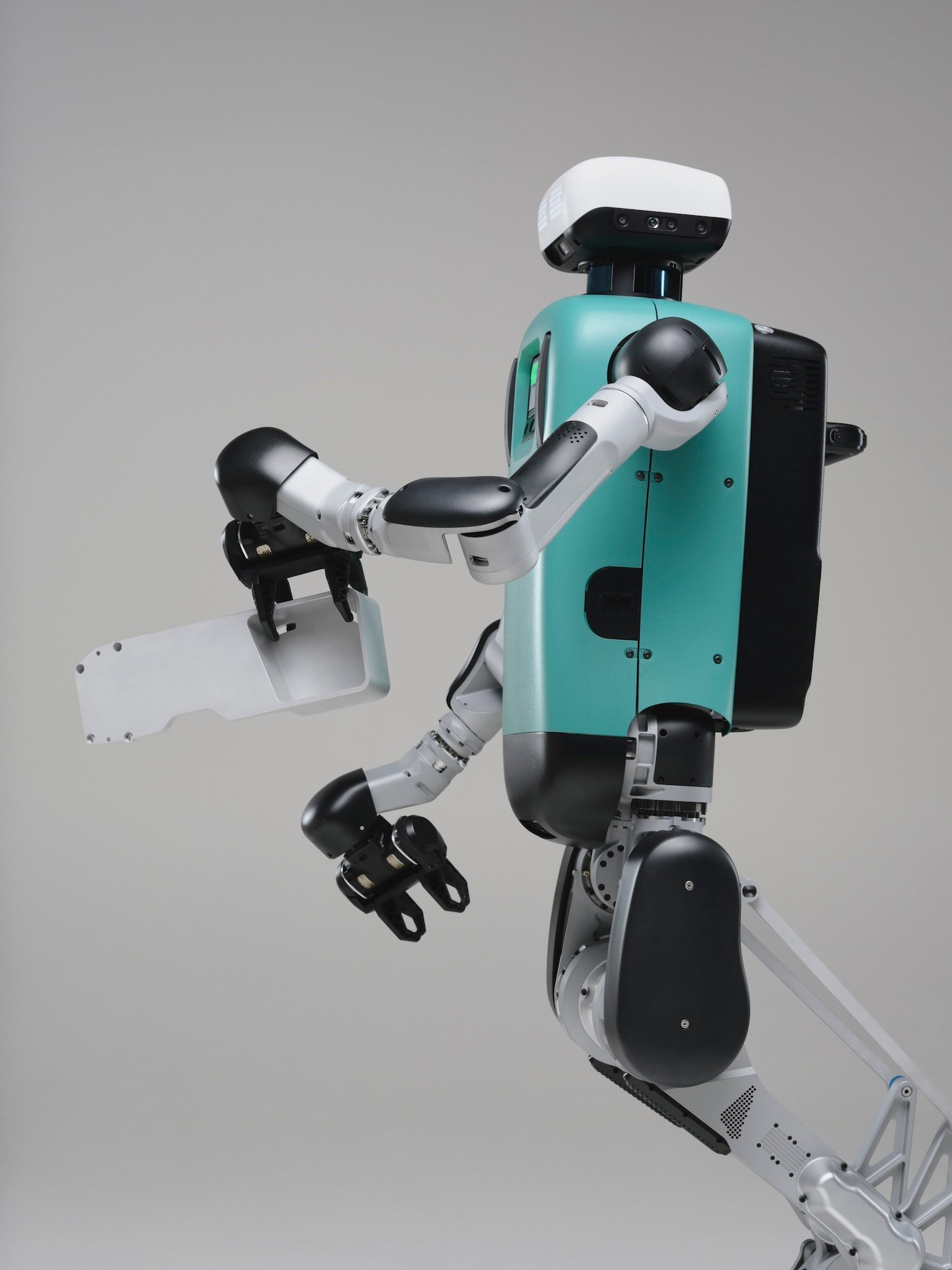 Digit di Agility Robotics con braccio e gripper orientati verso un oggetto