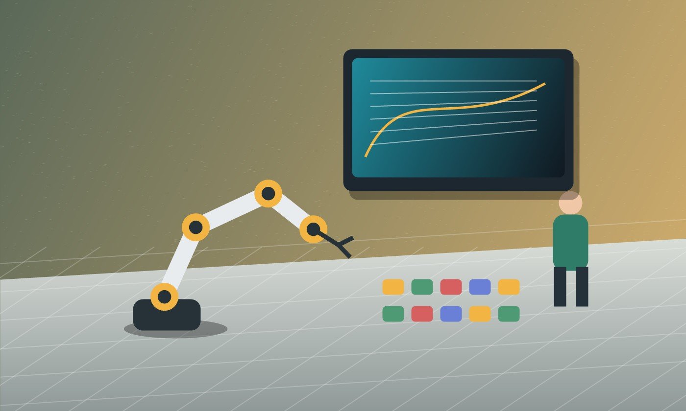 Operatore che controlla una cella robotica simulata prima della produzione
